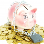 pink piggy bank secured with chain and padlock